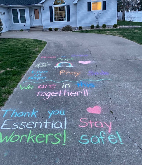 A driveway chalk words and art